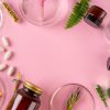 Herbs and Herbal dietary supplements top view on pink background